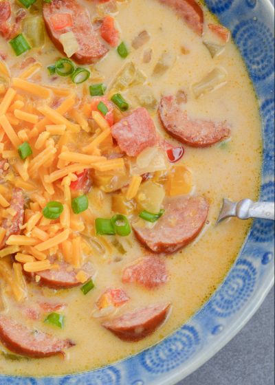 This Cheesy Smoked Sausage Soup is loaded with spicy sausage, tender vegetables in a creamy, cheesy sauce! At less than 7 net carbs per serving this is a great low carb, keto-friendly soup!