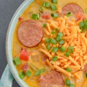 This Cheesy Smoked Sausage Soup is loaded with spicy sausage, tender vegetables in a creamy, cheesy sauce! At less than 7 net carbs per serving this is a great low carb, keto-friendly soup!