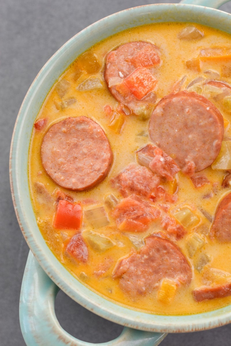 This Cheesy Smoked Sausage Soup is loaded with spicy sausage, tender vegetables in a creamy, cheesy sauce! At less than 7 net carbs per serving this is a great low carb, keto-friendly soup!