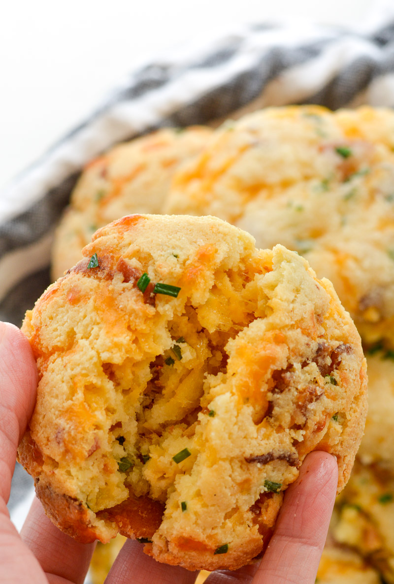 These almond flour Keto Bacon Cheddar Chive Biscuits are exploding with flavor! Packed with sharp cheddar cheese, crispy bacon and fresh chives these biscuits are the perfect low carb side with just 4 net carbs each!