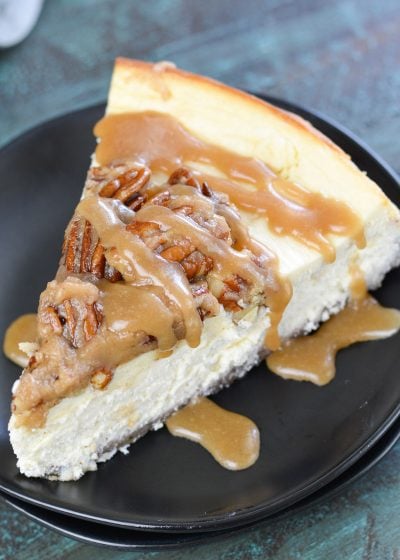 This rich Keto Butter Pecan Cheesecake is an incredibly decadent low carb dessert! With a delicious pecan crust, creamy cheesecake, keto caramel sauce and roasted pecans, you would never guess this is just 3.5 net carbs per slice!