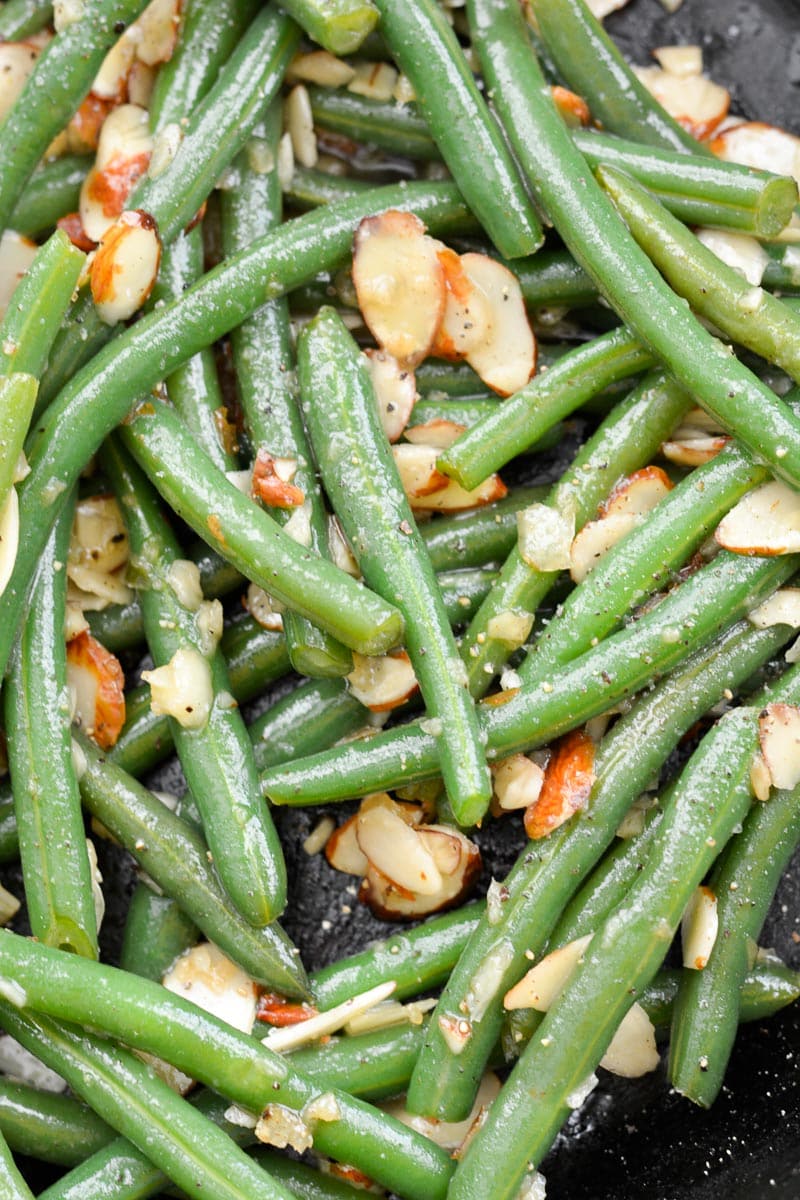 Green Beans Almondine is a classic side dish that goes perfectly with most entrees! Tender green beans are tossed in a rich butter sauce and toasted almonds, for only 3.6 net carbs per serving! 