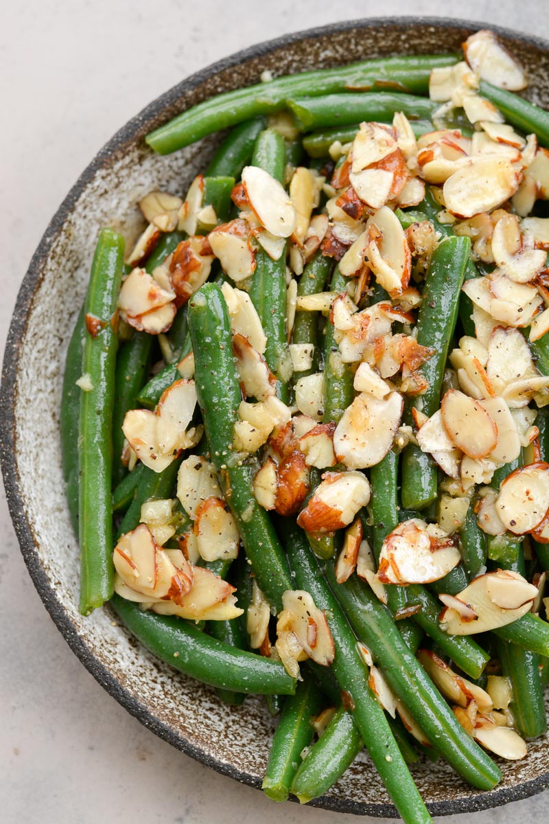 Green Beans Almondine is a classic side dish that goes perfectly with most entrees! Tender green beans are tossed in a rich butter sauce and toasted almonds, for only 3.6 net carbs per serving! 