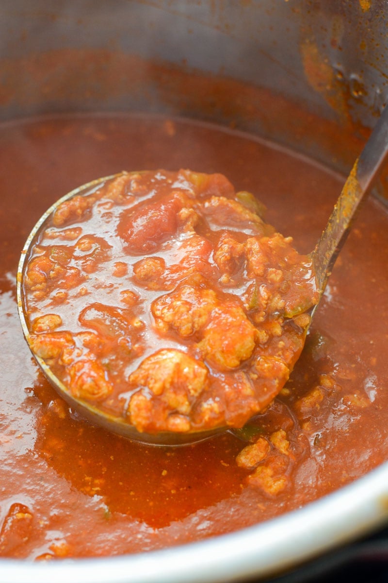 This Instant Pot No Bean Chili is loaded with ground beef, tomatoes and spices! This keto-friendly chili recipe has just 15 minutes cooking time and about 8 net carbs per serving!