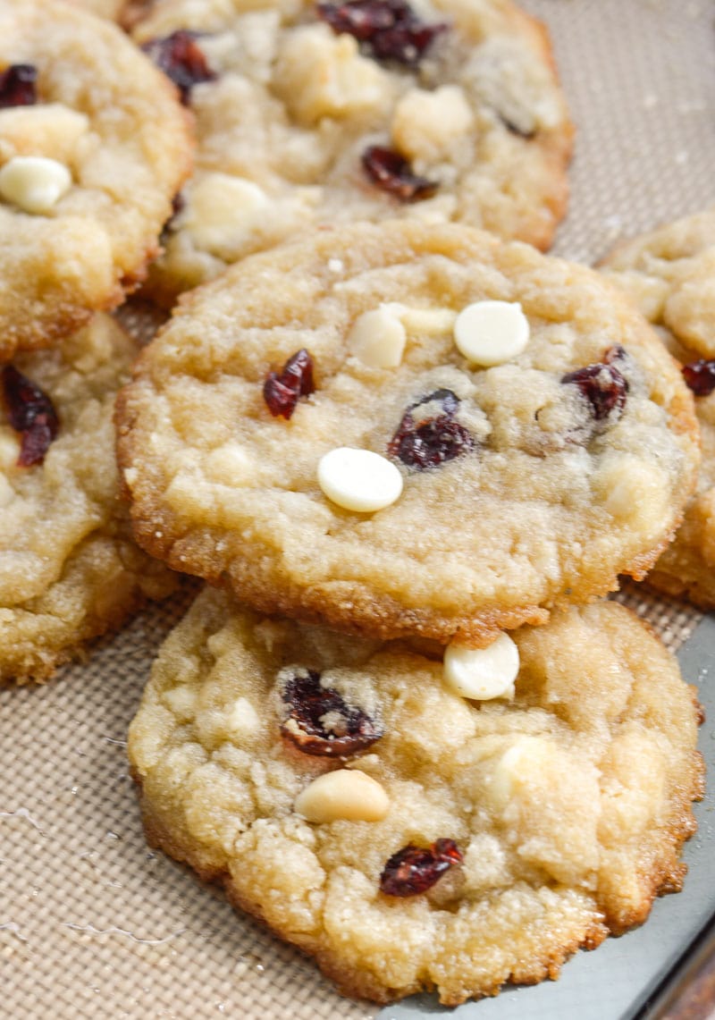 These Cranberry White Chocolate Macadamia Nut Cookies are the perfect low carb cookie! Each cookie is packed with sweet white chocolate chips, sweet dried cranberries and salty macadamia nuts, for about 4 net carbs each!