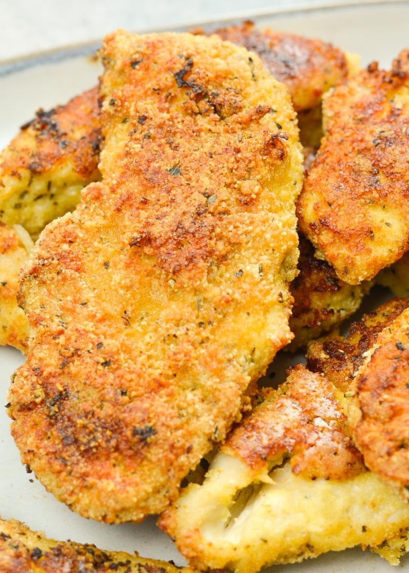 keto chicken tenders piled on a plate