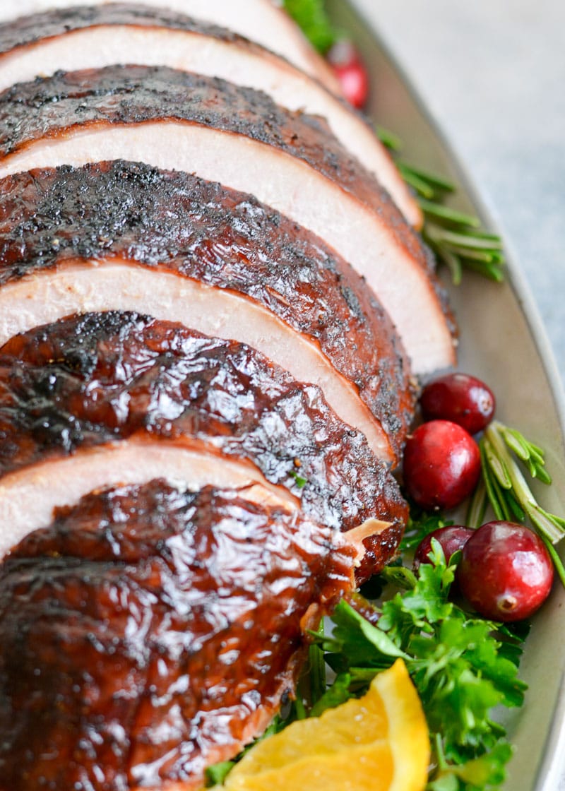 This Smoked Whole Turkey recipe is stuffed and coated in a homemade spice rub, then slow smoked to tender and juicy perfection.