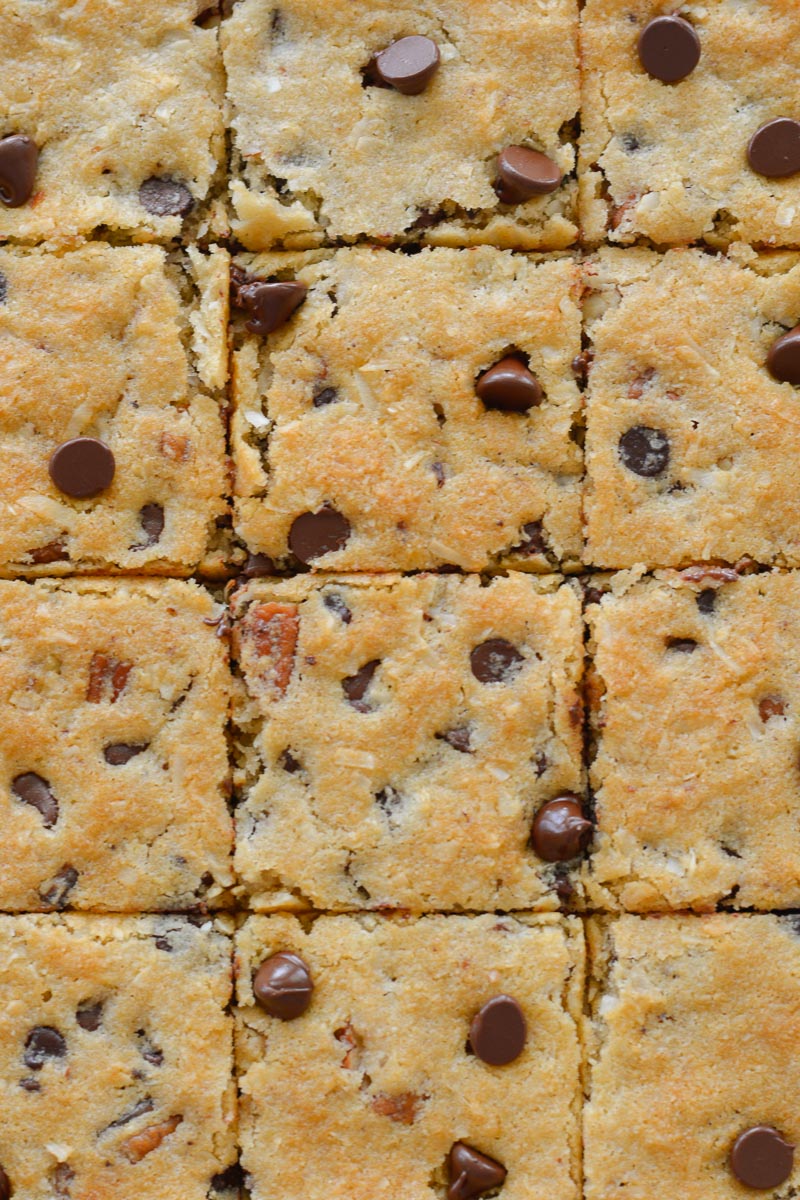 chocolate chip sheet pan cookies sliced on a pan