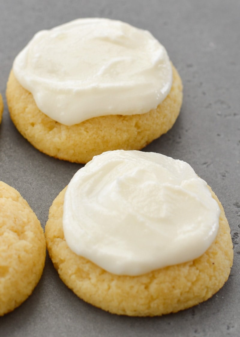 Two frosted keto almond flour sugar cookies