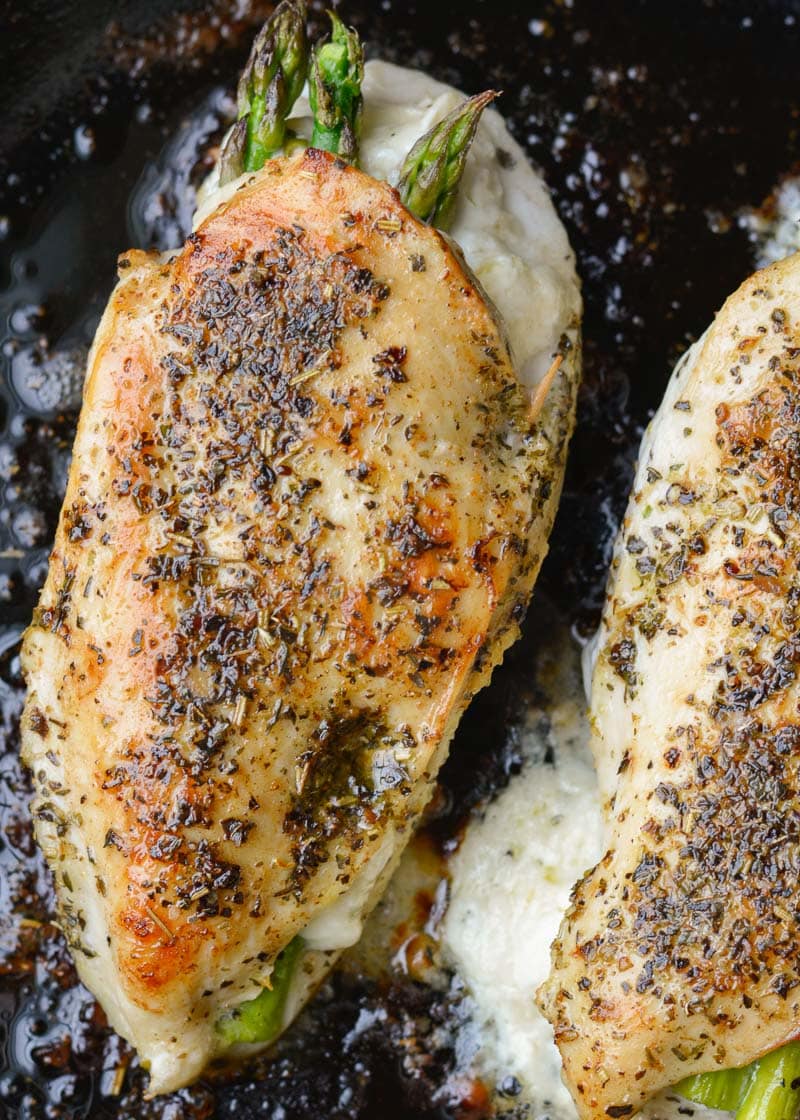 This Asparagus Stuffed Chicken is loaded with two kinds of cheese, tender asparagus and is rubbed with an Italian herb mix. This one pan, low carb recipe has about 2 net carbs per serving and is ready in 30 minutes. 