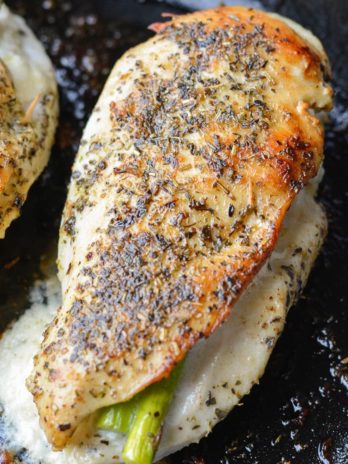 This Asparagus Stuffed Chicken is loaded with two kinds of cheese, tender asparagus and is rubbed with an Italian herb mix. This one pan, low carb recipe has about 2 net carbs per serving and is ready in 30 minutes. 