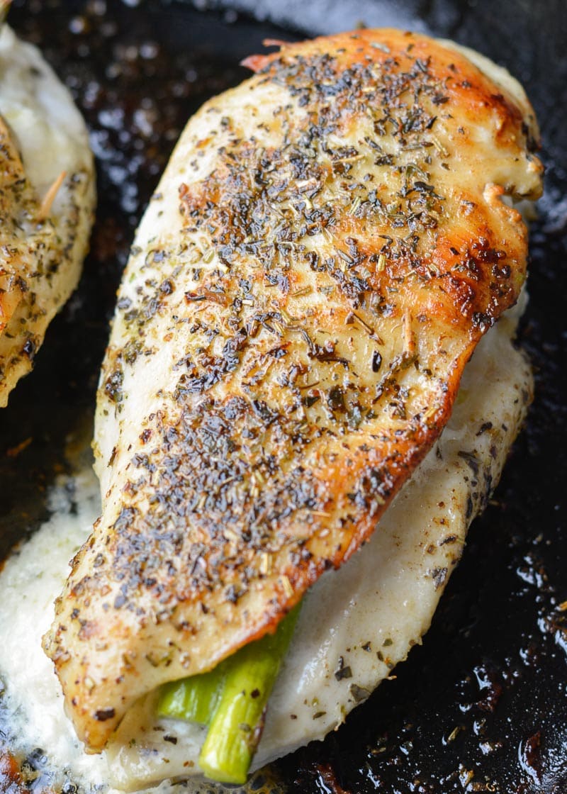 This Asparagus Stuffed Chicken is loaded with two kinds of cheese, tender asparagus and is rubbed with an Italian herb mix. This one pan, low carb recipe has about 2 net carbs per serving and is ready in 30 minutes. 