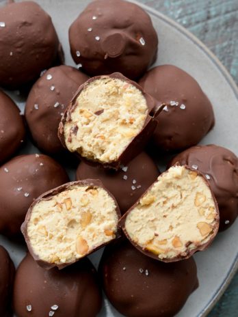 These Keto Peanut Butter Cheesecake Truffles require just 6 ingredients and no baking! These low carb delights are about one net carb each and perfect for satisfying your sweet tooth! 