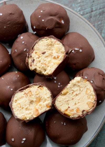 These Keto Peanut Butter Cheesecake Truffles require just 6 ingredients and no baking! These low carb delights are about one net carb each and perfect for satisfying your sweet tooth! 