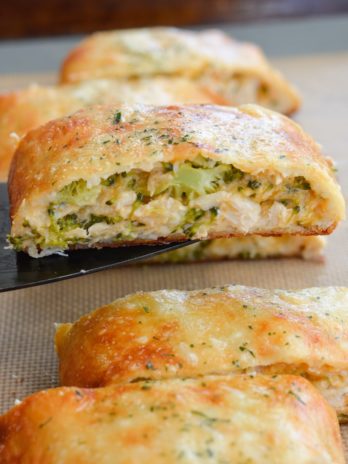 This Chicken Broccoli Cheddar Hot Pocket is loaded with tender chicken, fresh broccoli and loads of cheese wrapped in a perfectly soft and fluffy crust! Each slice is about 3 net carbs! 