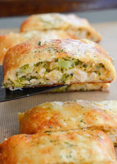 This Chicken Broccoli Cheddar Hot Pocket is loaded with tender chicken, fresh broccoli and loads of cheese wrapped in a perfectly soft and fluffy crust! Each slice is about 3 net carbs! 