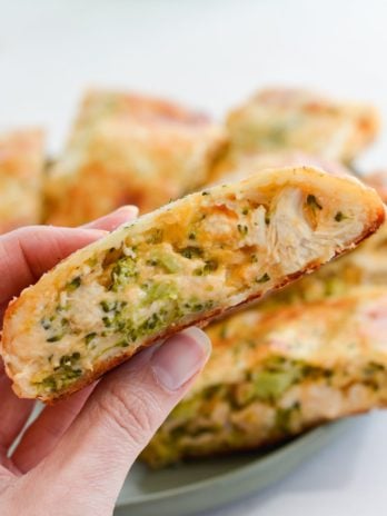 This Chicken Broccoli Cheddar Hot Pocket is loaded with tender chicken, fresh broccoli and loads of cheese wrapped in a perfectly soft and fluffy crust! Each slice is about 3 net carbs! 