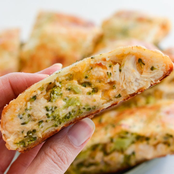 This Chicken Broccoli Cheddar Hot Pocket is loaded with tender chicken, fresh broccoli and loads of cheese wrapped in a perfectly soft and fluffy crust! Each slice is about 3 net carbs! 