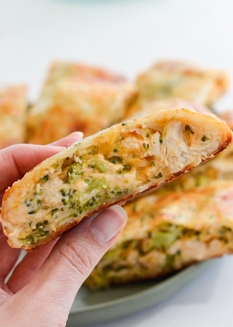 This Chicken Broccoli Cheddar Hot Pocket is loaded with tender chicken, fresh broccoli and loads of cheese wrapped in a perfectly soft and fluffy crust! Each slice is about 3 net carbs! 