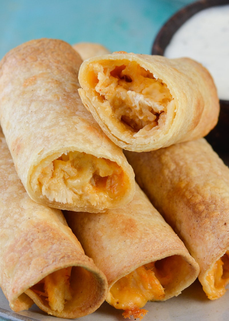 These 6-ingredient Buffalo Chicken Taquitos make an excellent, super-filling snack or dinner! Start with cooked, shredded chicken to have them ready in 30 minutes!