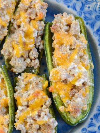 Keto Sausage Stuffed Jalapeno Poppers are the ultimate low carb appetizer! Each generous serving size has less than 3 net carbs!