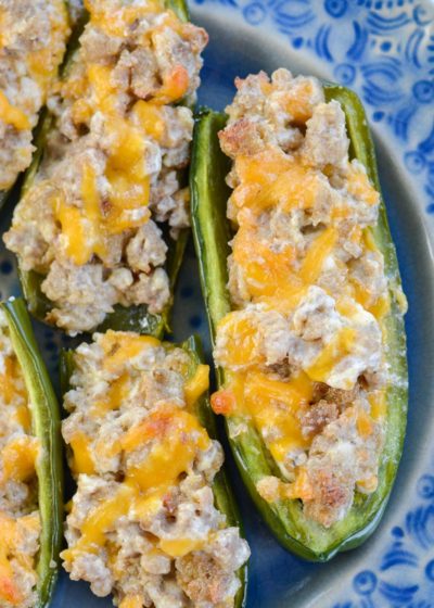 Keto Sausage Stuffed Jalapeno Poppers are the ultimate low carb appetizer! Each generous serving size has less than 3 net carbs!