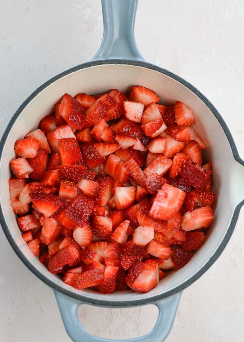 Keto Strawberry Thumbprint Cookies are the perfect sweet treat for about 2 net carbs each! Low carb sugar cookies are packed with fresh strawberry sauce and baked until soft and chewy! 