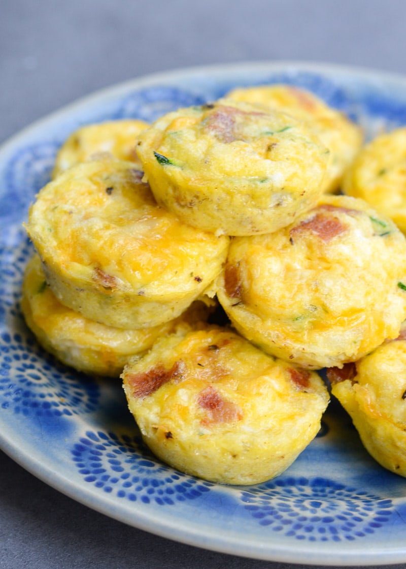 These savory Bacon Egg and Zucchini Bites are loaded with fresh veggies, salty bacon and tons of each! Each mini muffin has just 0.2 net carbs each making them an amazing keto breakfast option!