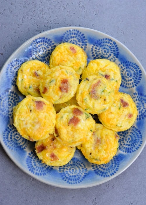 These savory Bacon Egg and Zucchini Bites are loaded with fresh veggies, salty bacon and tons of each! Each mini muffin has just 0.2 net carbs each making them an amazing keto breakfast option!