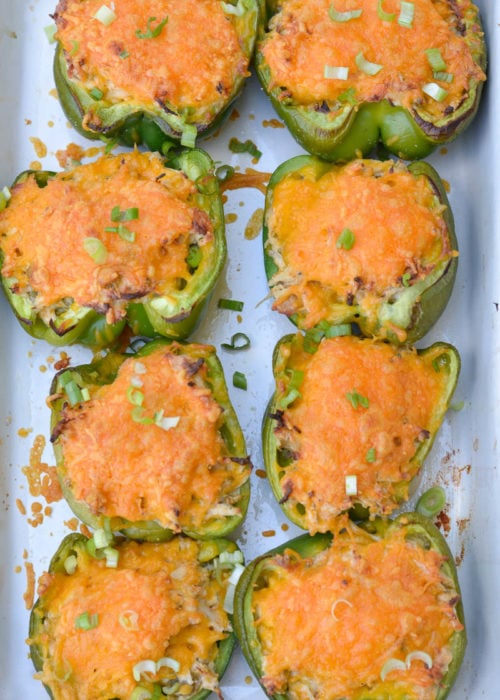 These six ingredient Green Chile Chicken Stuffed Peppers have under 5 net carbs per serving! Packed with chicken, cheese and spices this is an easy dinner your entire family will love!