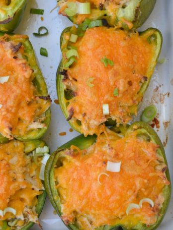 These six ingredient Green Chile Chicken Stuffed Peppers have under 5 net carbs per serving! Packed with chicken, cheese and spices this is an easy dinner your entire family will love!