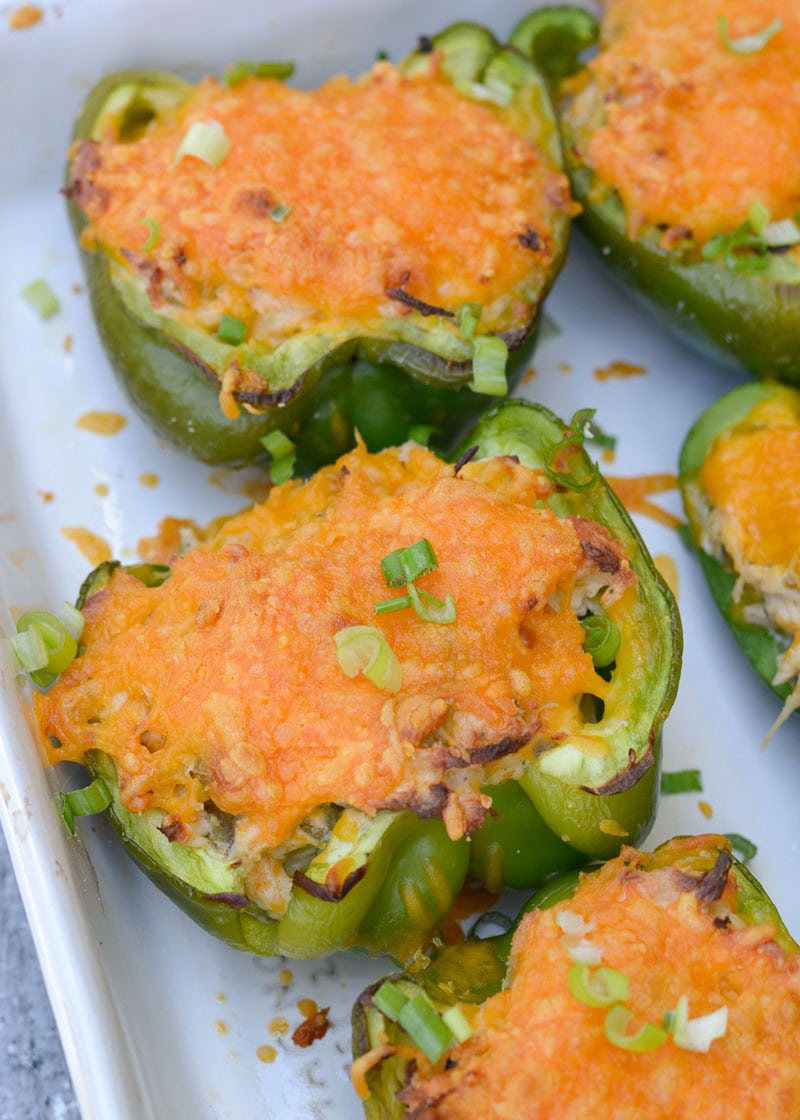 These six ingredient Green Chile Chicken Stuffed Peppers have under 5 net carbs per serving! Packed with chicken, cheese and spices, this is an easy dinner your entire family will love!