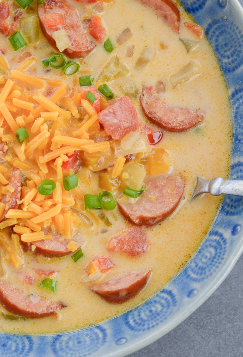 This Cheesy Smoked Sausage Soup is loaded with spicy sausage, tender vegetables in a creamy, cheesy sauce! At less than 7 net carbs per serving this is a great low carb, keto-friendly soup!