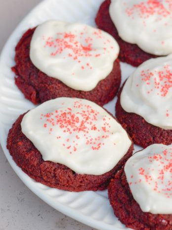 These soft and chewy Keto Red Velvet Cookies have a hint of cocoa and are covered with a low carb cream cheese frosting! Each sugar free cookie has less than 3 net carbs each!