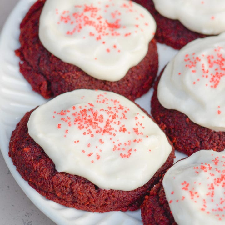 These soft and chewy Keto Red Velvet Cookies have a hint of cocoa and are covered with a low carb cream cheese frosting! Each sugar free cookie has less than 3 net carbs each!