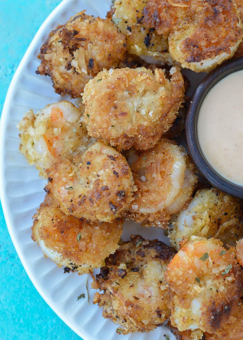 This delicious Keto Coconut Shrimp will quickly join your low-carb dinner rotation! This low-carb seafood dinner can be cooked in 30 minutes or less on the stove, in the oven, or in an Air Fryer!