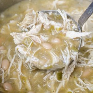 This Instant Pot White Bean Chicken Chili recipe is so easy! Loaded with chicken, beans, flavorful green chiles and spices this soup is ready in under 30 minutes and always a crowd pleaser! 