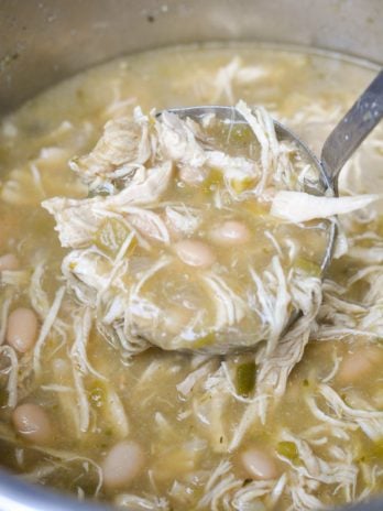 This Instant Pot White Bean Chicken Chili recipe is so easy! Loaded with chicken, beans, flavorful green chiles and spices this soup is ready in under 30 minutes and always a crowd pleaser! 