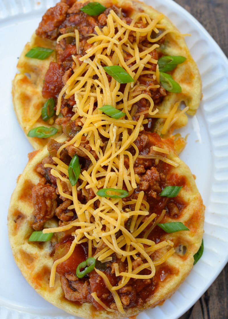 Enjoy a crispy, cheesy chaffle covered with savory keto chili for about three net carbs! These Keto Chili Cheese Chaffles are quick, easy and so satisfying!