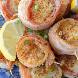 These Bacon Wrapped Scallops require just five ingredients and require about 12 minutes of cook time! This is an easy low carb appetizer or elegant dinner recipe! 