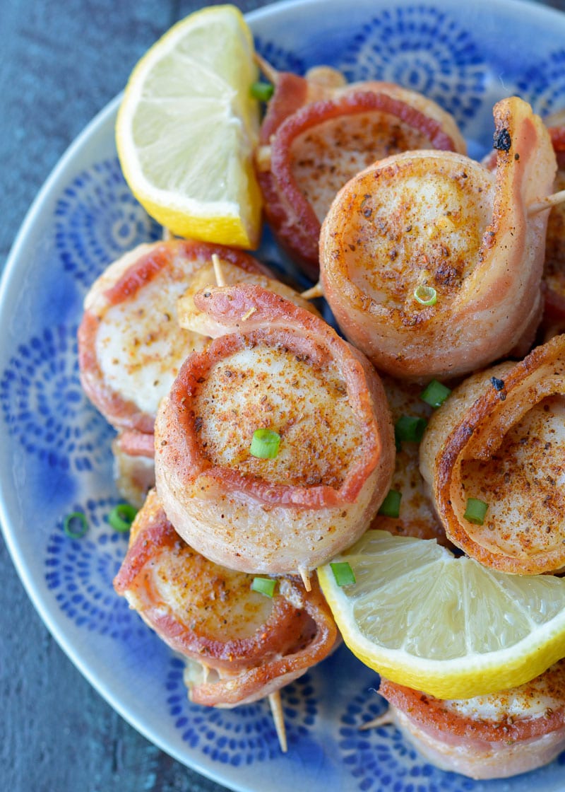 These Bacon Wrapped Scallops require just five ingredients and require about 12 minutes of cook time! This is an easy low carb appetizer or elegant dinner recipe! 