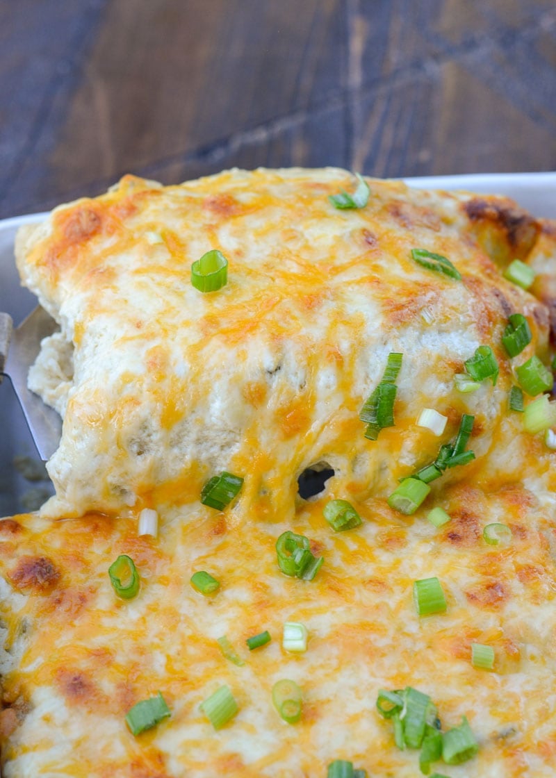 Keto Sour Cream Chicken Enchiladas are an easy dinner you'd never guess are actually low carb! This easy chicken dish is loaded with shredded chicken, green chiles, sour cream, and cheese! Enjoy two loaded enchiladas for under 8 net carbs!