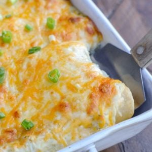 Keto Sour Cream Chicken Enchiladas are an easy dinner you'd never guess are actually low carb! This easy chicken dish is loaded with shredded chicken, green chiles, sour cream, and cheese! Enjoy two loaded enchiladas for under 8 net carbs!