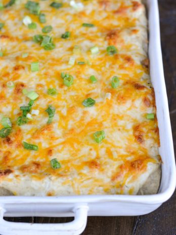 Keto Sour Cream Chicken Enchiladas are an easy dinner you'd never guess are actually low carb! This easy chicken dish is loaded with shredded chicken, green chiles, sour cream, and cheese! Enjoy two loaded enchiladas for under 8 net carbs!