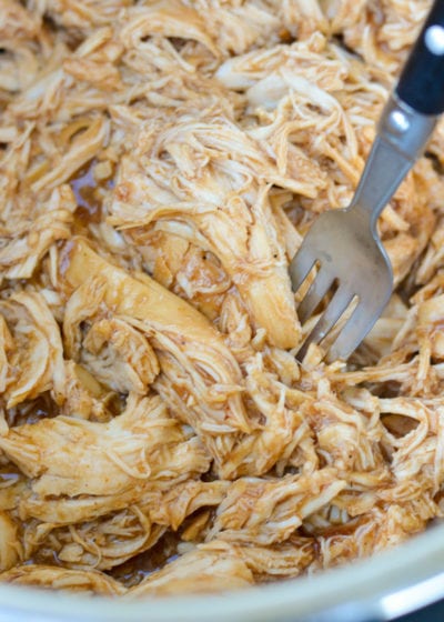 This low carb Instant Pot BBQ Chicken requires just five simple ingredients and less than 15 minutes of cook time! Try my favorite pulled chicken recipe on a salad or wrap! 