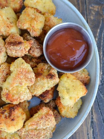 These delicious Keto Chicken Nuggets can be baked or air-fried and are low carb and gluten free! These make a perfect lunch or easy dinner for under 4 net carbs!