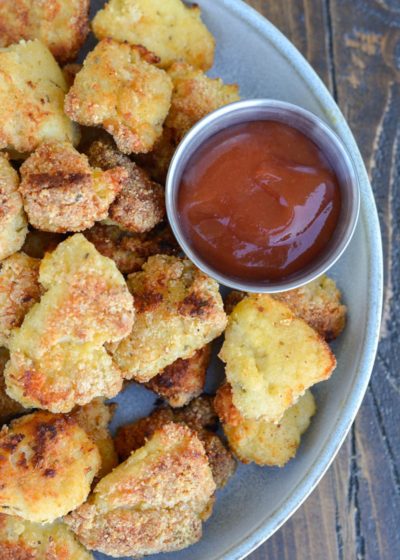 These delicious Keto Chicken Nuggets can be baked or air-fried and are low carb and gluten free! These make a perfect lunch or easy dinner for under 4 net carbs!
