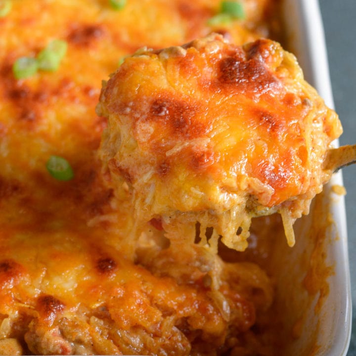 This Taco Spaghetti Squash Casserole is loaded with taco meat, tomatoes, vegetables and cheese! This cozy keto casserole has less than 6 net carbs and is great for keto meal prep!