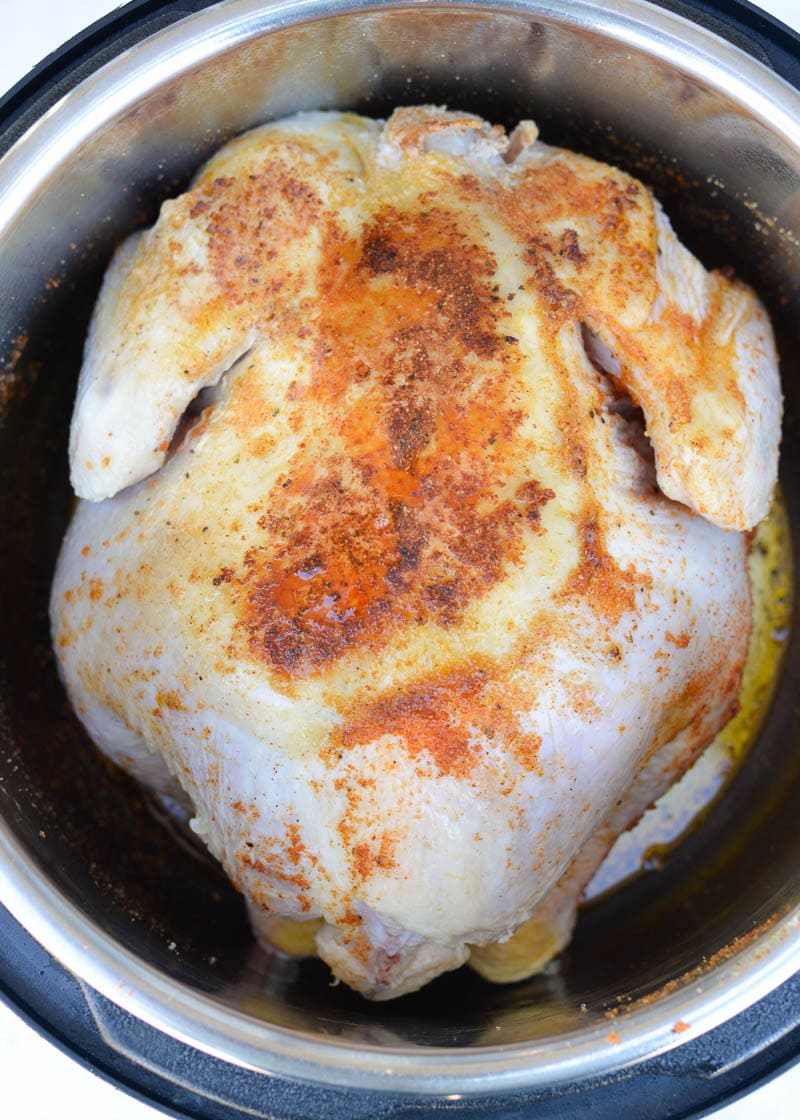 Learn how to make a juicy, flavorful Instant Pot Whole Chicken in less than 30 minutes! This pressure cooker whole chicken recipe is naturally keto-friendly and great for low carb meal prep!