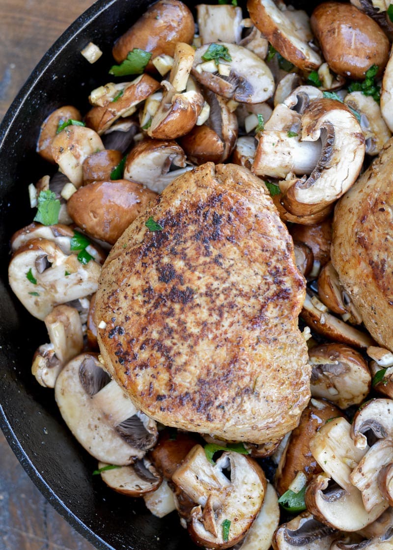 These Cast Iron Pork Chops with Mushrooms is the perfect low-carb weeknight dinner for two! Ready in under 30 minutes with just 8 net carbs, this keto-friendly dinner will be a quick favorite!